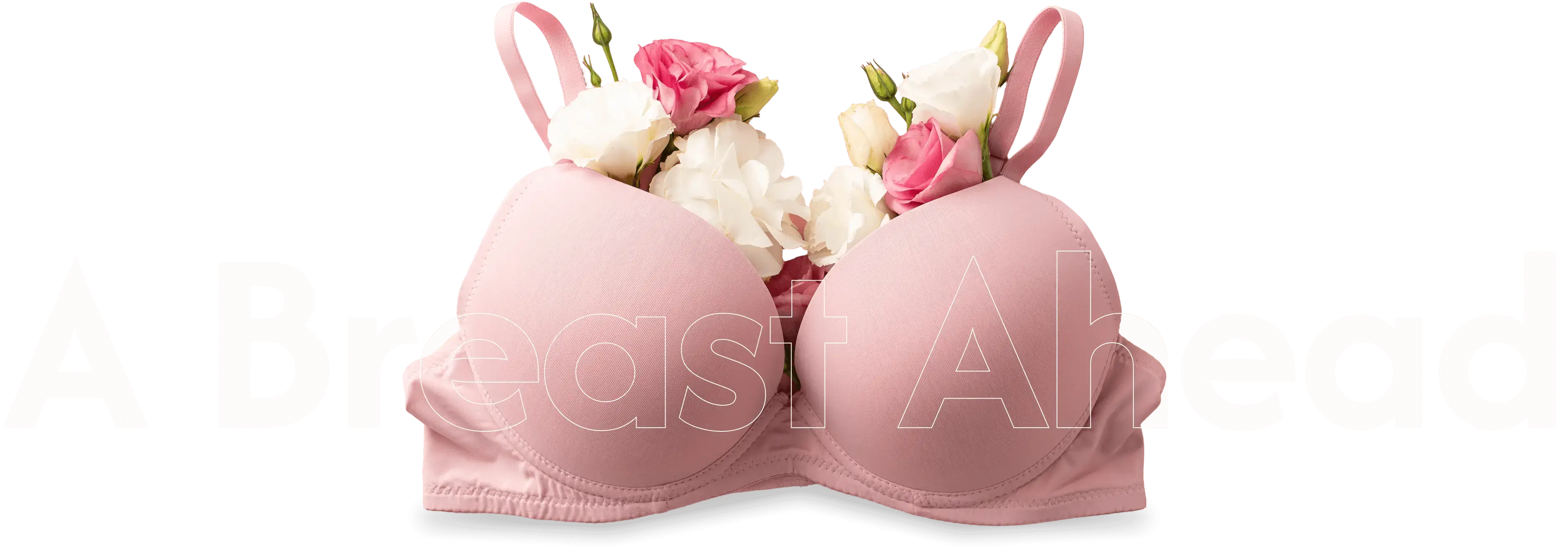 Pink bra filled with blooming flowers.